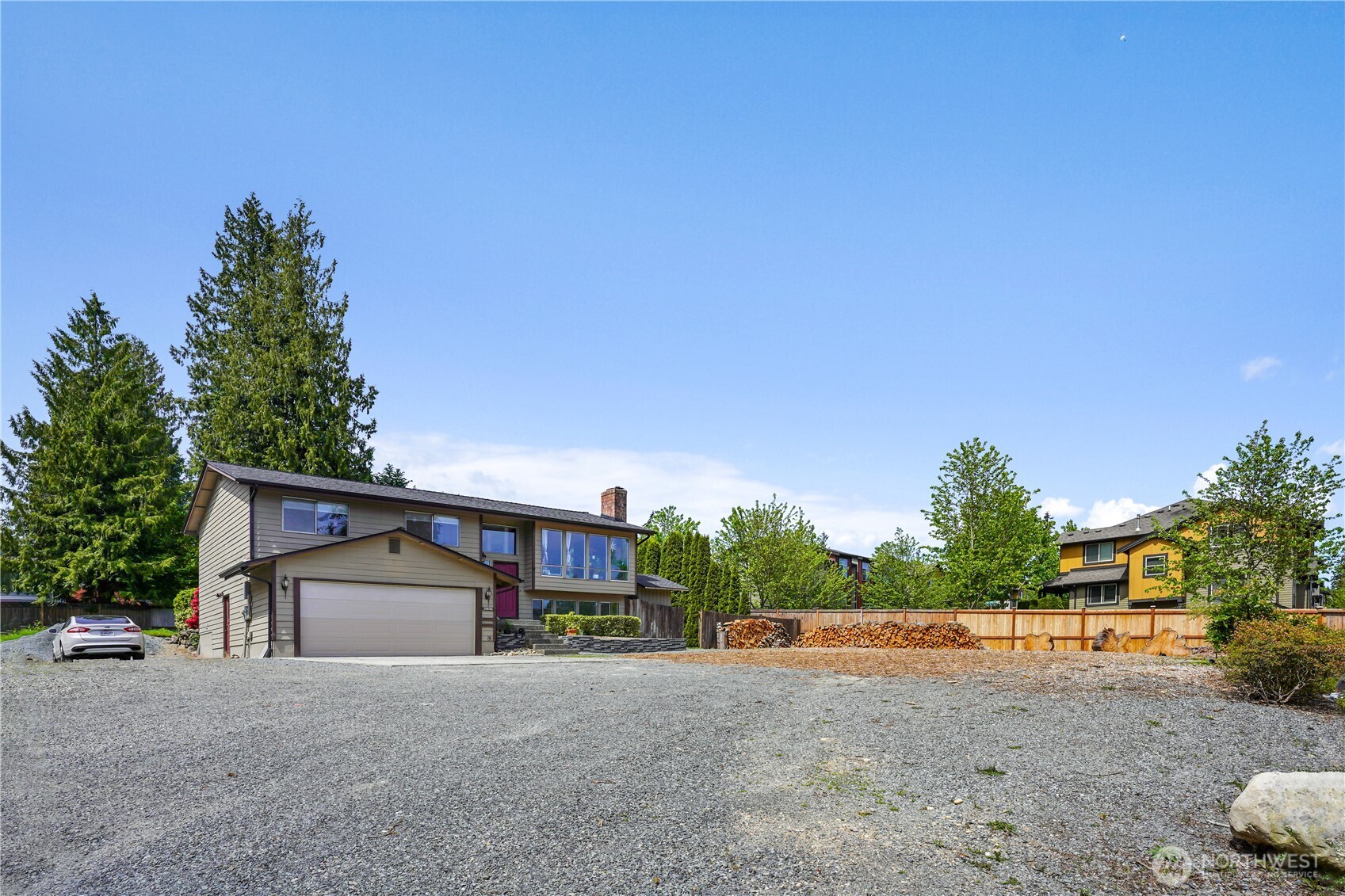 16604 3rd Avenue Southeast Bothell, WA 98012 - Photo 17 of 22 a front view of a house with a yard and garage
