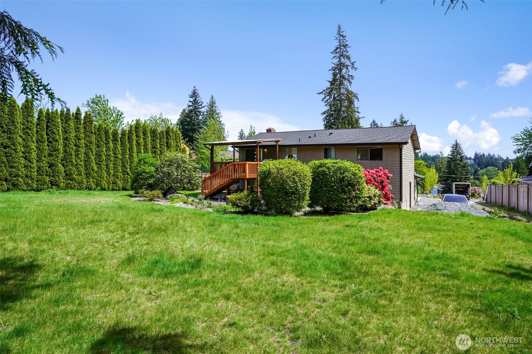 16604 3rd Avenue Southeast Bothell, WA 98012 - Photo 18 of 22 a front view of a house with garden