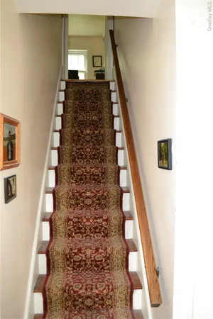 a view of entryway with a front door