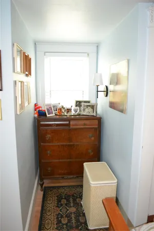 a bathroom with a sink a toilet and a shower