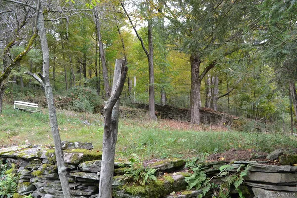 a view of street with parked cars