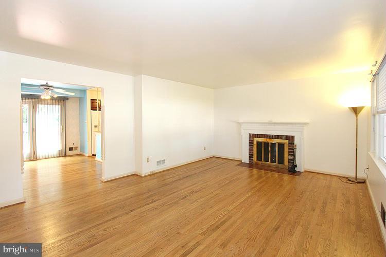 9103 Adelphi Road Hyattsville, MD 20783 - Photo 5 of 28 Living Room w/Fireplace