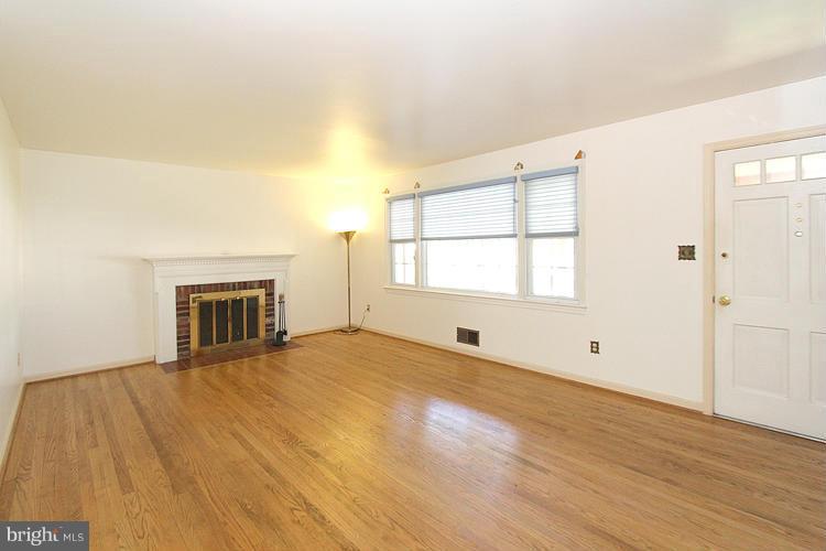 9103 Adelphi Road Hyattsville, MD 20783 - Photo 6 of 28 Living Room w/Fireplace