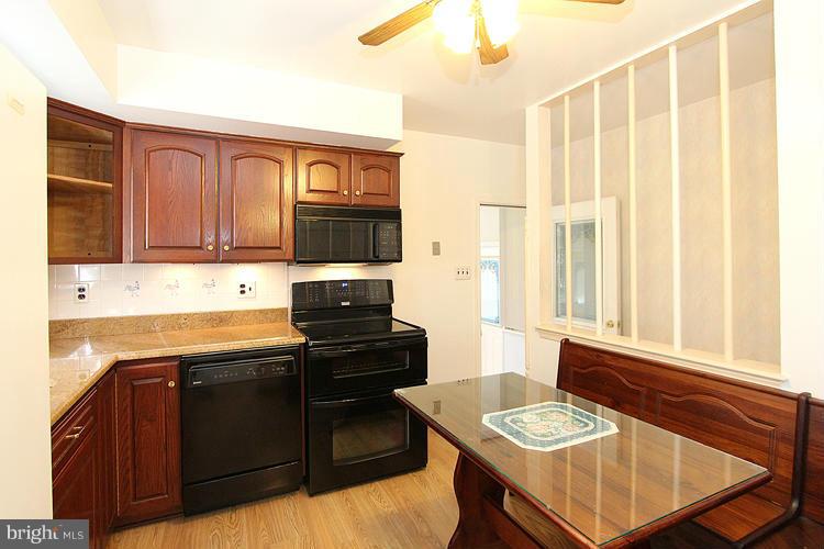 9103 Adelphi Road Hyattsville, MD 20783 - Photo 8 of 28 Tablespace Kitchen