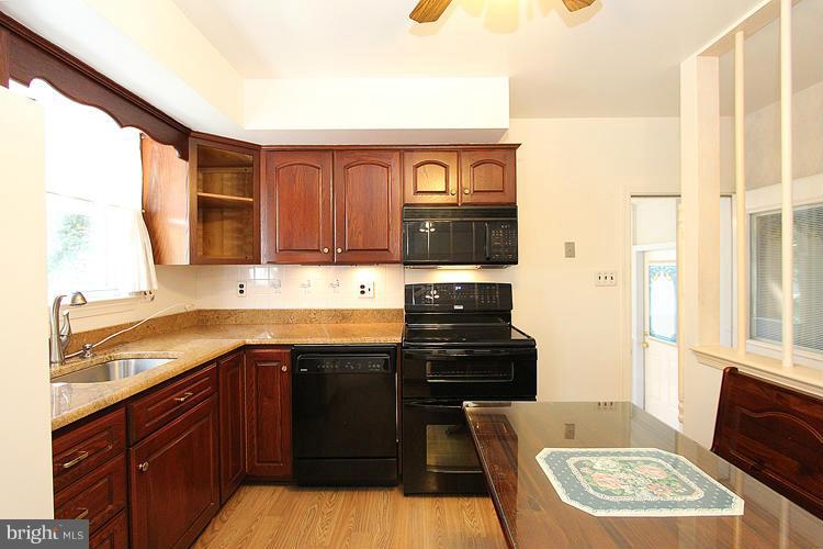 9103 Adelphi Road Hyattsville, MD 20783 - Photo 9 of 28 Tablespace Kitchen