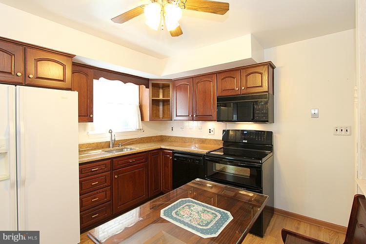 9103 Adelphi Road Hyattsville, MD 20783 - Photo 10 of 28 Tablespace Kitchen
