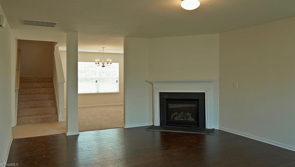 1924 Longshadow Street Rural Hall, NC 27045 - Photo 10 of 20 Living Room. This picture is to illustrate the Brookchase floor plan only and is not the actual home. The actual home is currently under construction. Options and color selection may vary in actual home.