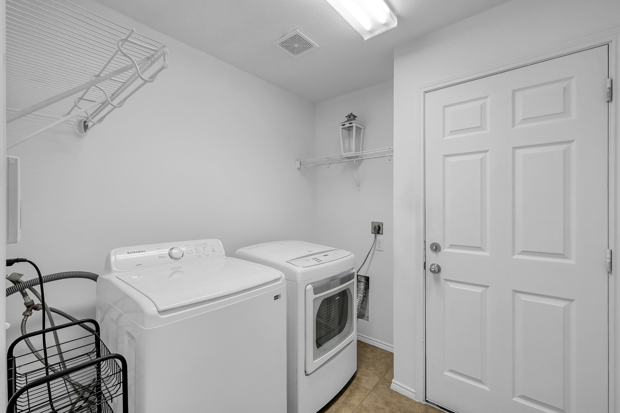 30206 Mesa Valley Drive Spring, TX 77386 - Photo 30 of 38 a utility room with dryer and washer