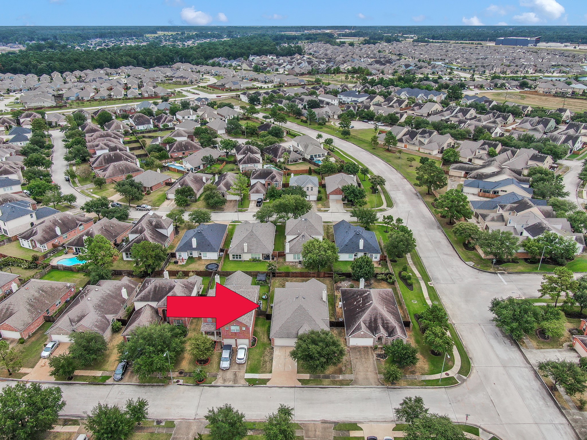 30206 Mesa Valley Drive Spring, TX 77386 - Photo 36 of 38 an aerial view of residential houses with outdoor space and parking
