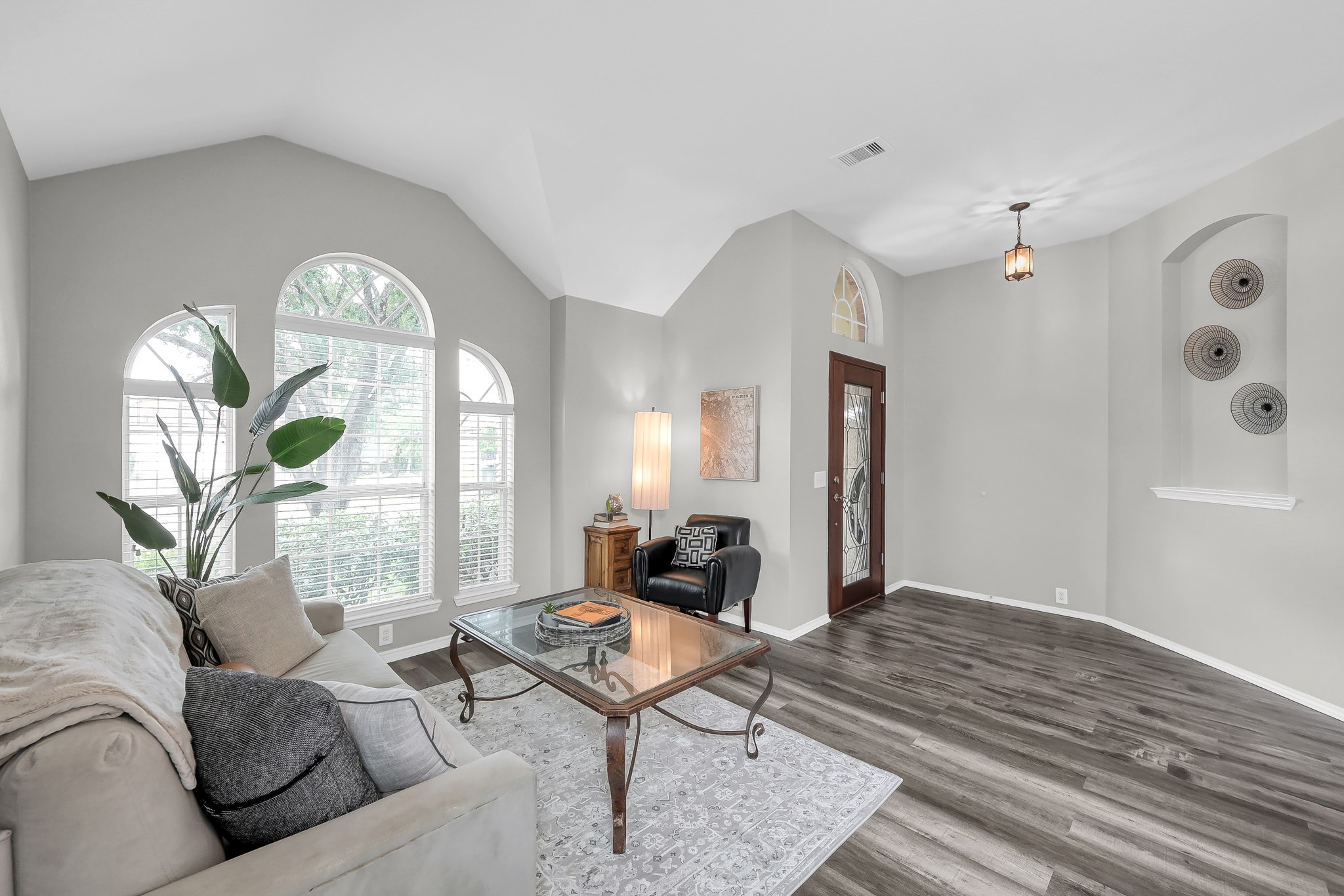 30206 Mesa Valley Drive Spring, TX 77386 - Photo 5 of 38 a living room with furniture a table and decor