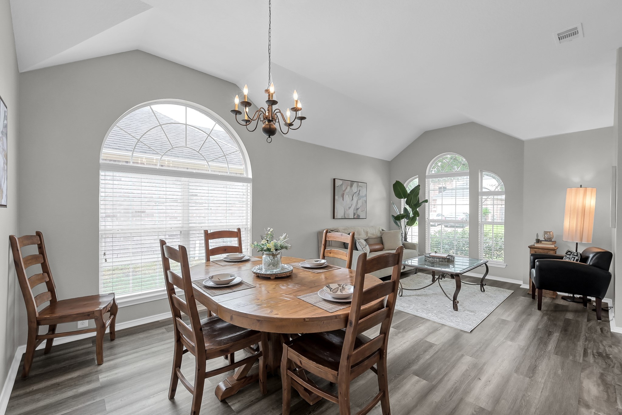 30206 Mesa Valley Drive Spring, TX 77386 - Photo 7 of 38 a view of a dining room with furniture window and wooden floor