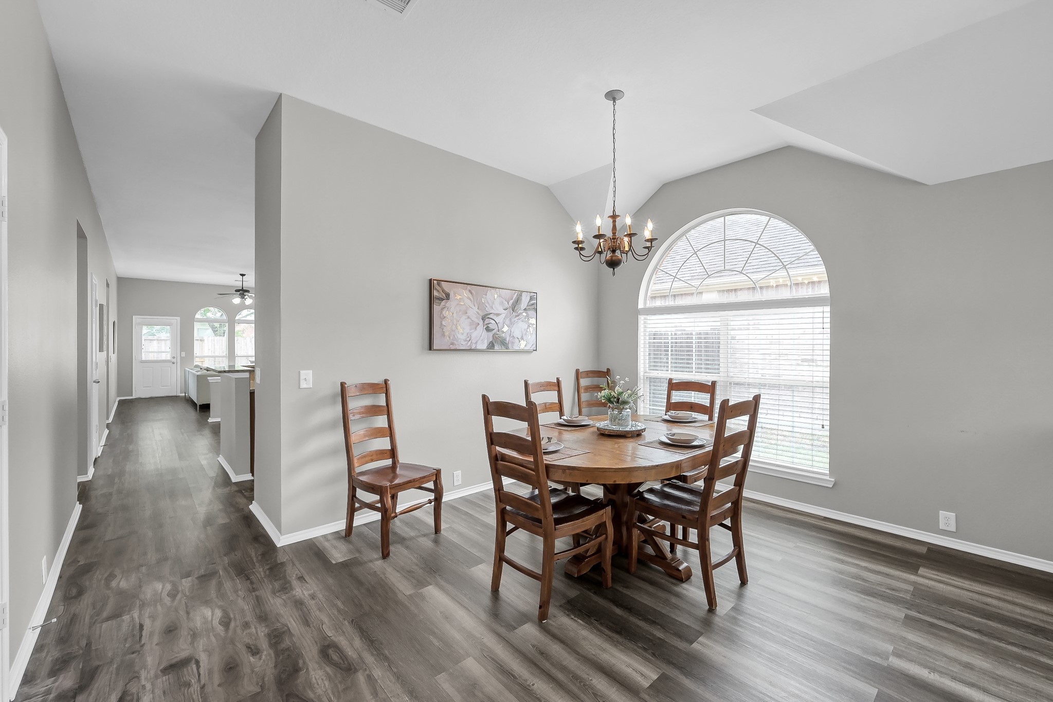 30206 Mesa Valley Drive Spring, TX 77386 - Photo 8 of 38 a view of a dining room with furniture window and wooden floor