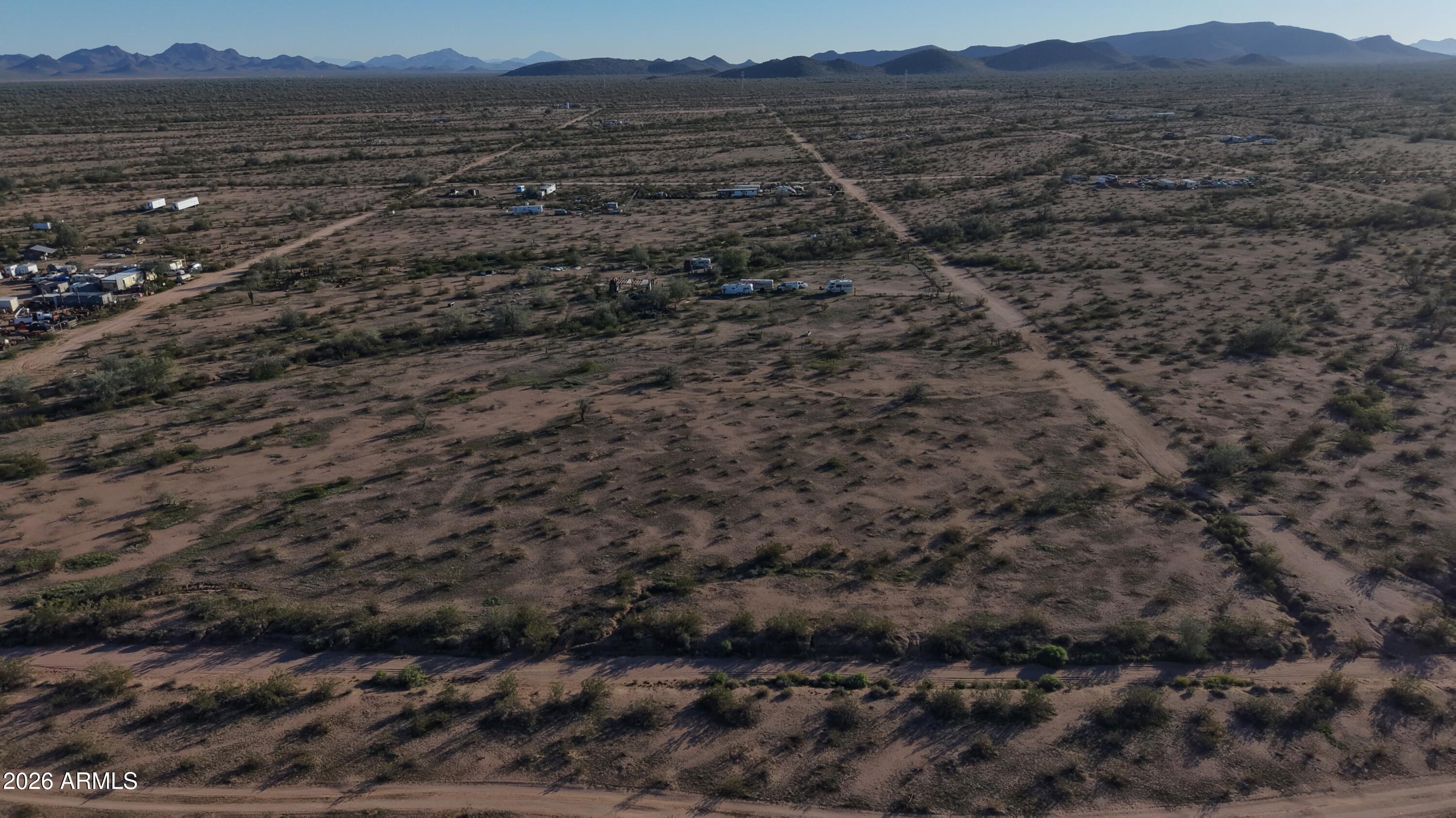 X South X S Round Up Road, Unit 107 Casa Grande, AZ 85193 - Photo 13 of 16 a view of a dry field
