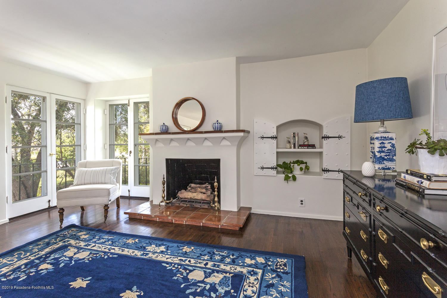 626 Chaucer Road San Marino, CA 91108 - Photo 18 of 31 a living room with furniture and a fireplace