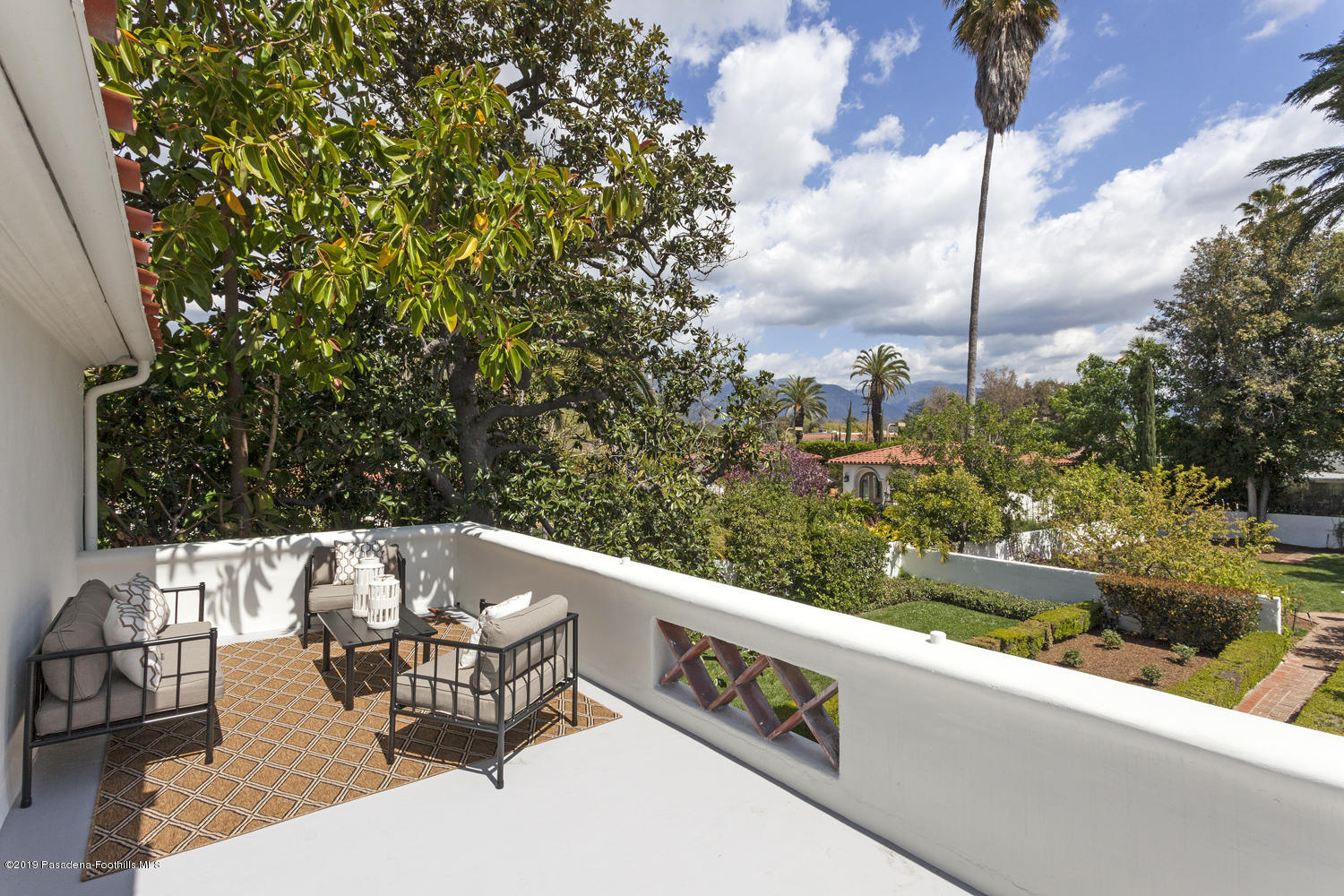 626 Chaucer Road San Marino, CA 91108 - Photo 20 of 31 a view of a bench in a backyard