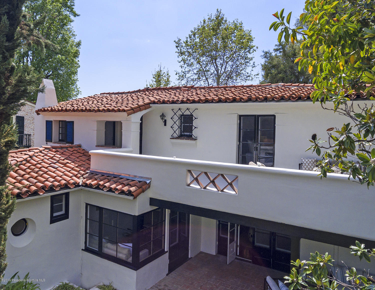 626 Chaucer Road San Marino, CA 91108 - Photo 21 of 31 a front view of a house with plants