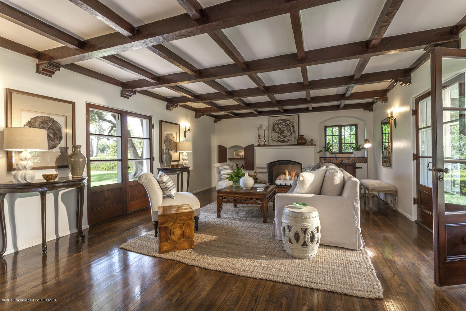 626 Chaucer Road San Marino, CA 91108 - Photo 9 of 31 a living room with fireplace furniture and a wooden floor