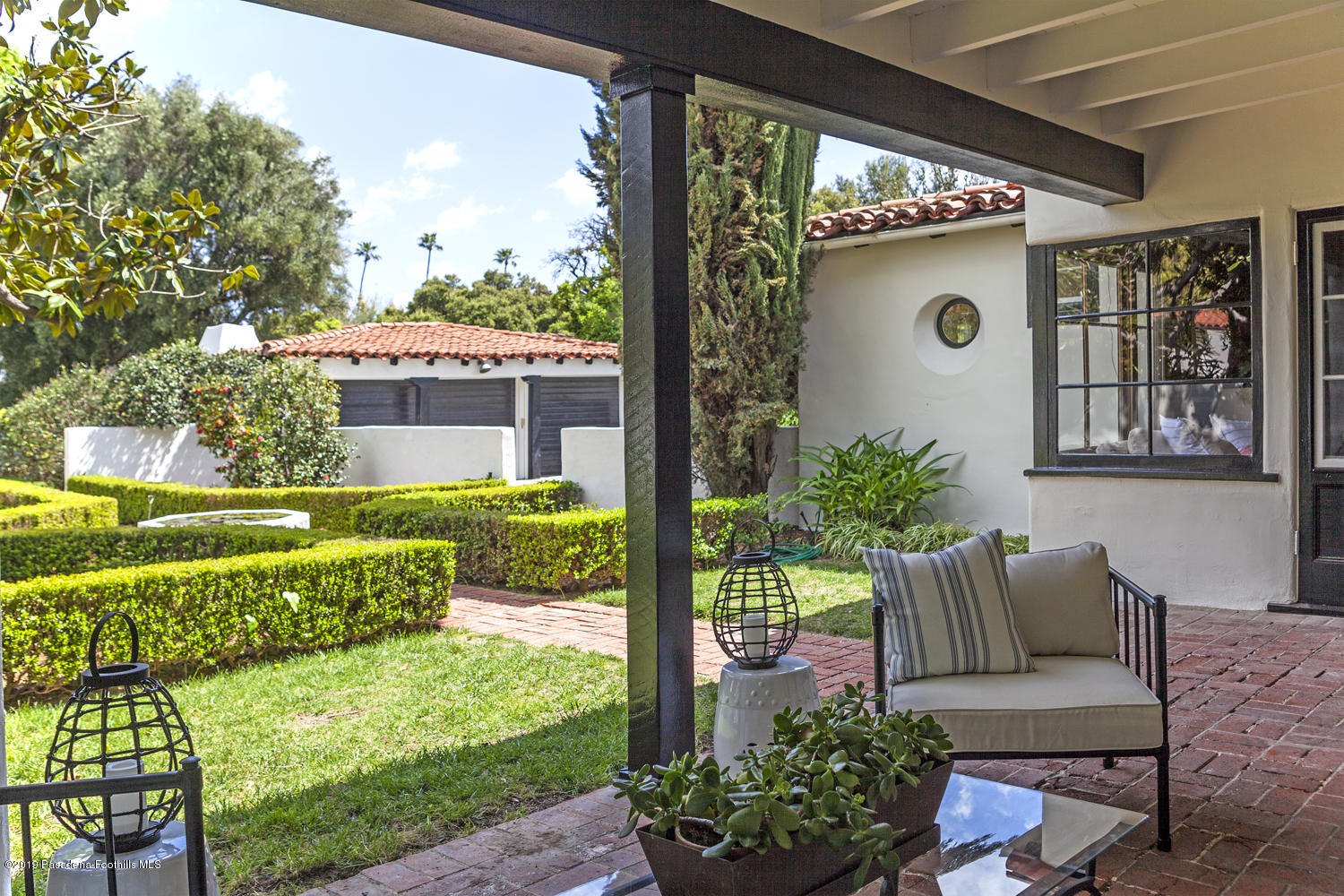 626 Chaucer Road San Marino, CA 91108 - Photo 10 of 31 a view of a porch with furniture and garden