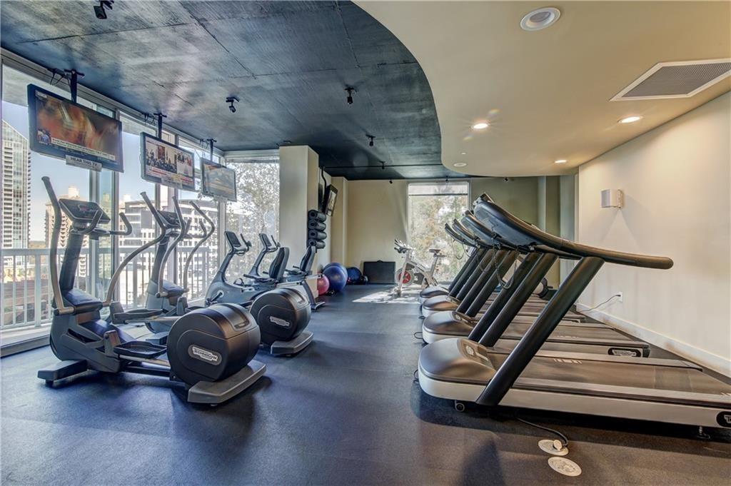 3324 Peachtree Road Northeast, Unit 908 Atlanta, GA 30326 - Photo 24 of 46 a view of a room with gym equipment