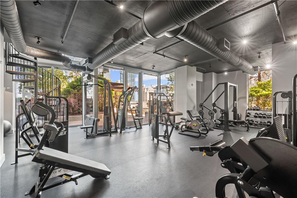 3324 Peachtree Road Northeast, Unit 908 Atlanta, GA 30326 - Photo 25 of 46 a view of a room with gym equipment
