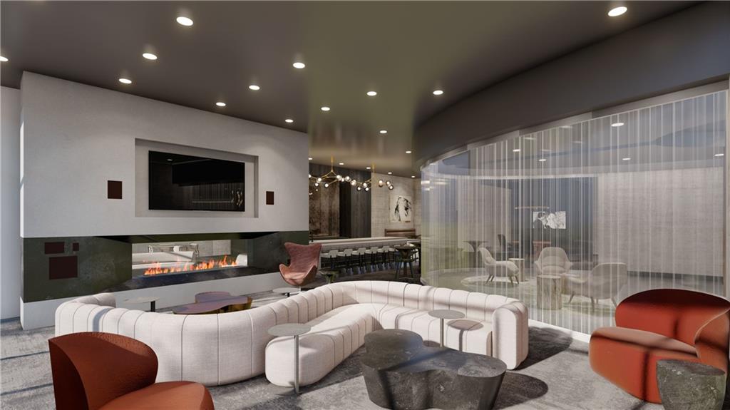 3324 Peachtree Road Northeast, Unit 908 Atlanta, GA 30326 - Photo 34 of 46 a living room with furniture and a flat screen tv