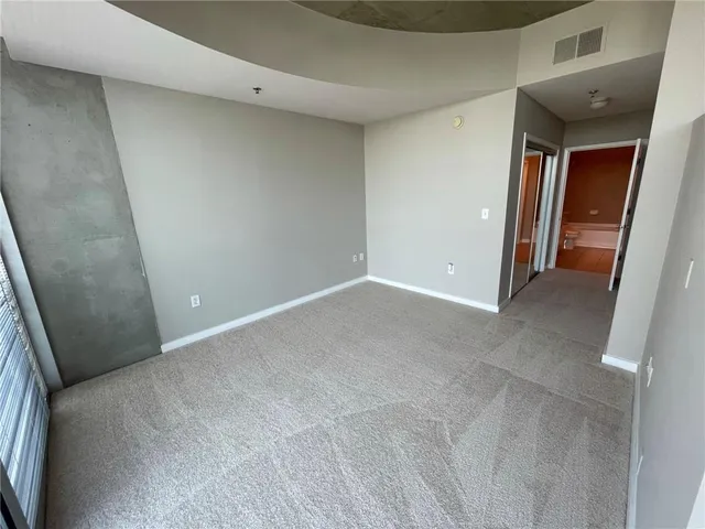 en empty room with windows