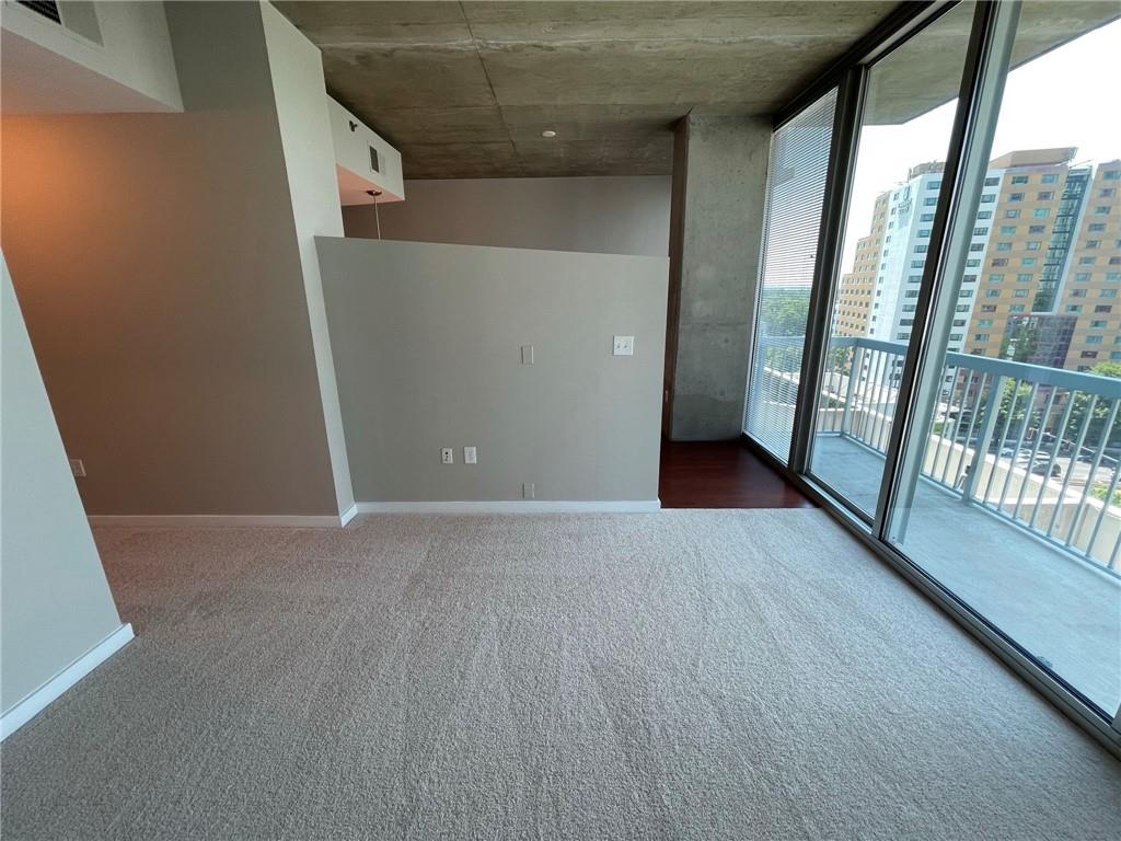 3324 Peachtree Road Northeast, Unit 908 Atlanta, GA 30326 - Photo 10 of 46 en empty room with windows