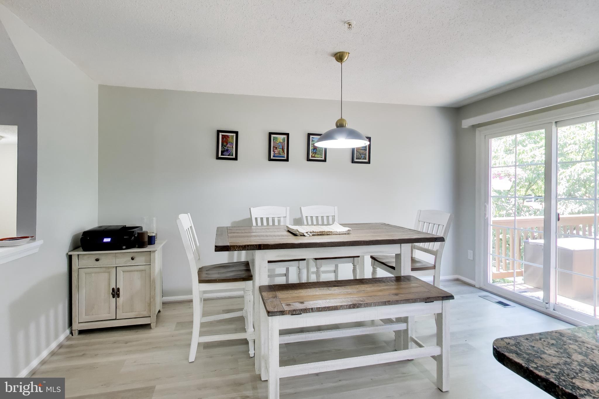15108 Deer Valley Terrace Silver Spring, MD 20906 - Photo 12 of 48 Kitchen dining area with slider to deck