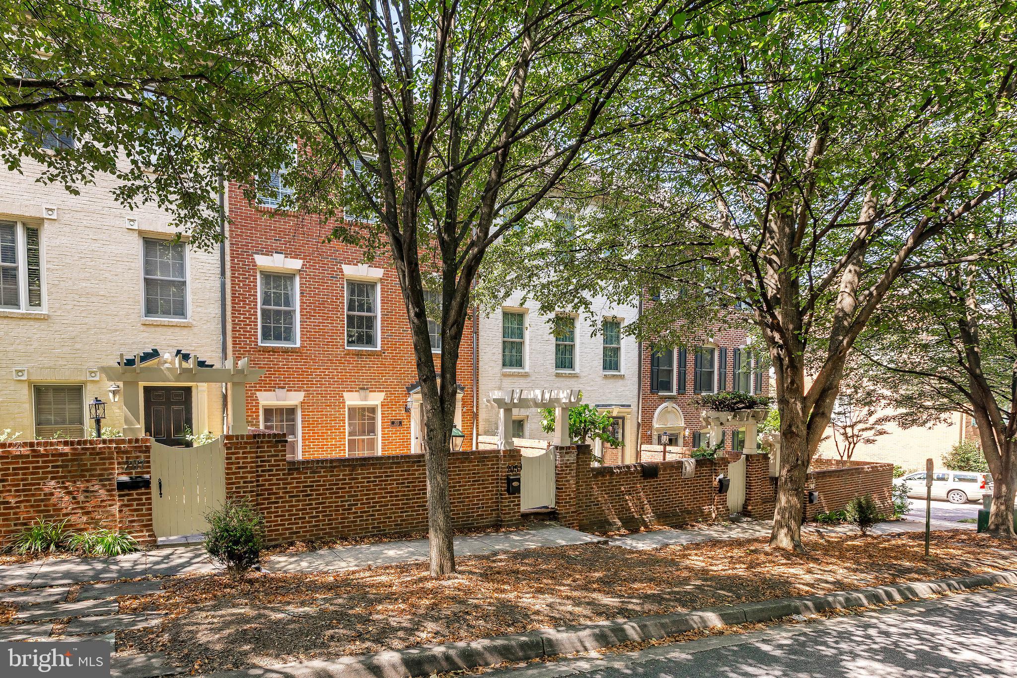 a view of a building with a large tree