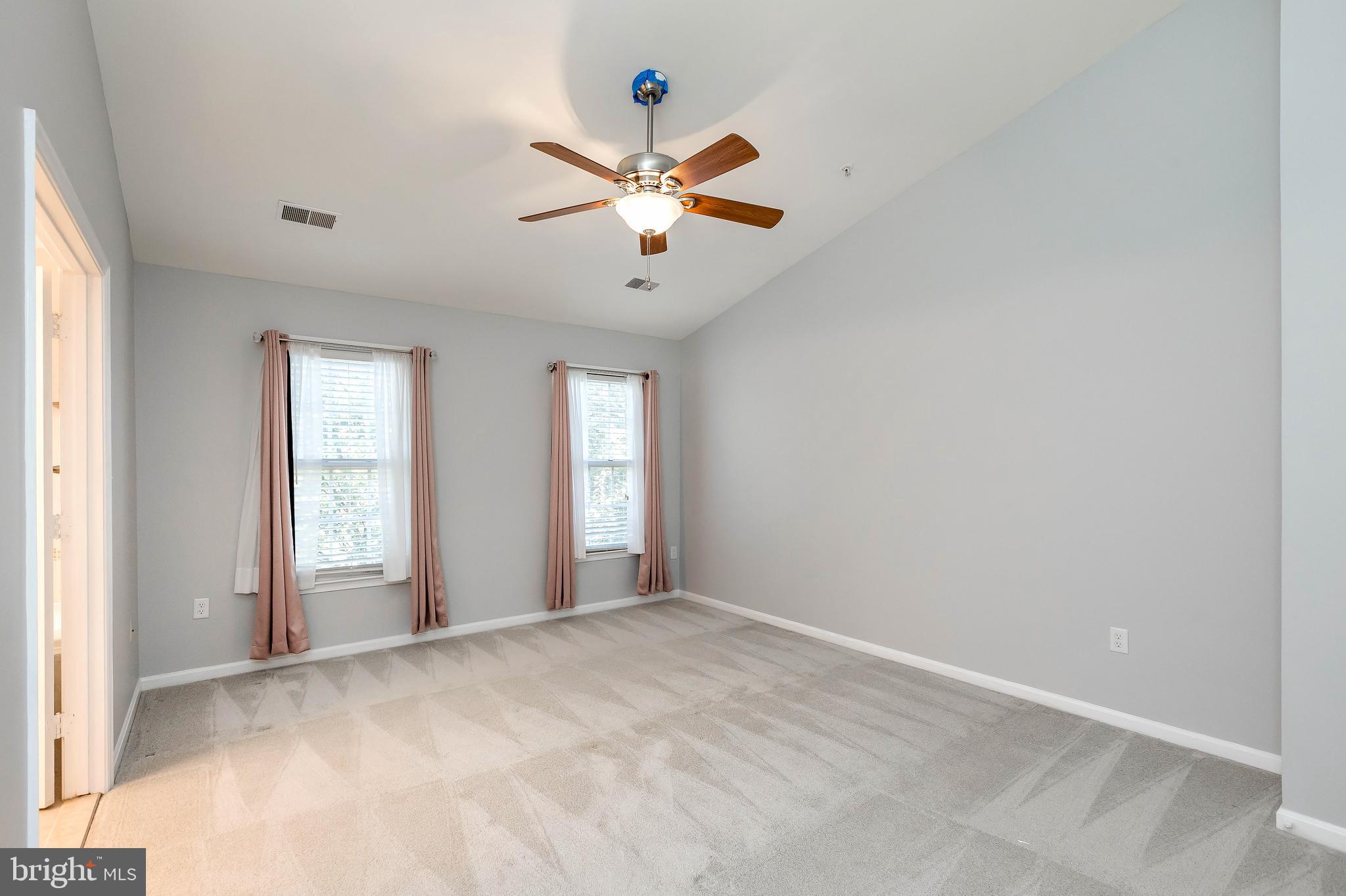 205 Ridgepoint Place Gaithersburg, MD 20878 - Photo 30 of 51 a view of an empty room with window