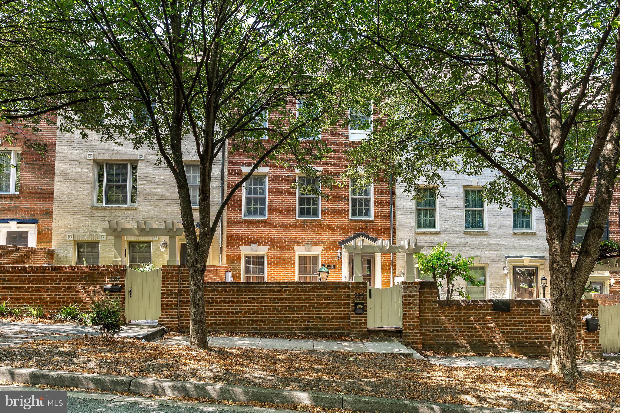 205 Ridgepoint Place Gaithersburg, MD 20878 - Photo 3 of 51 a front view of a house with a yard