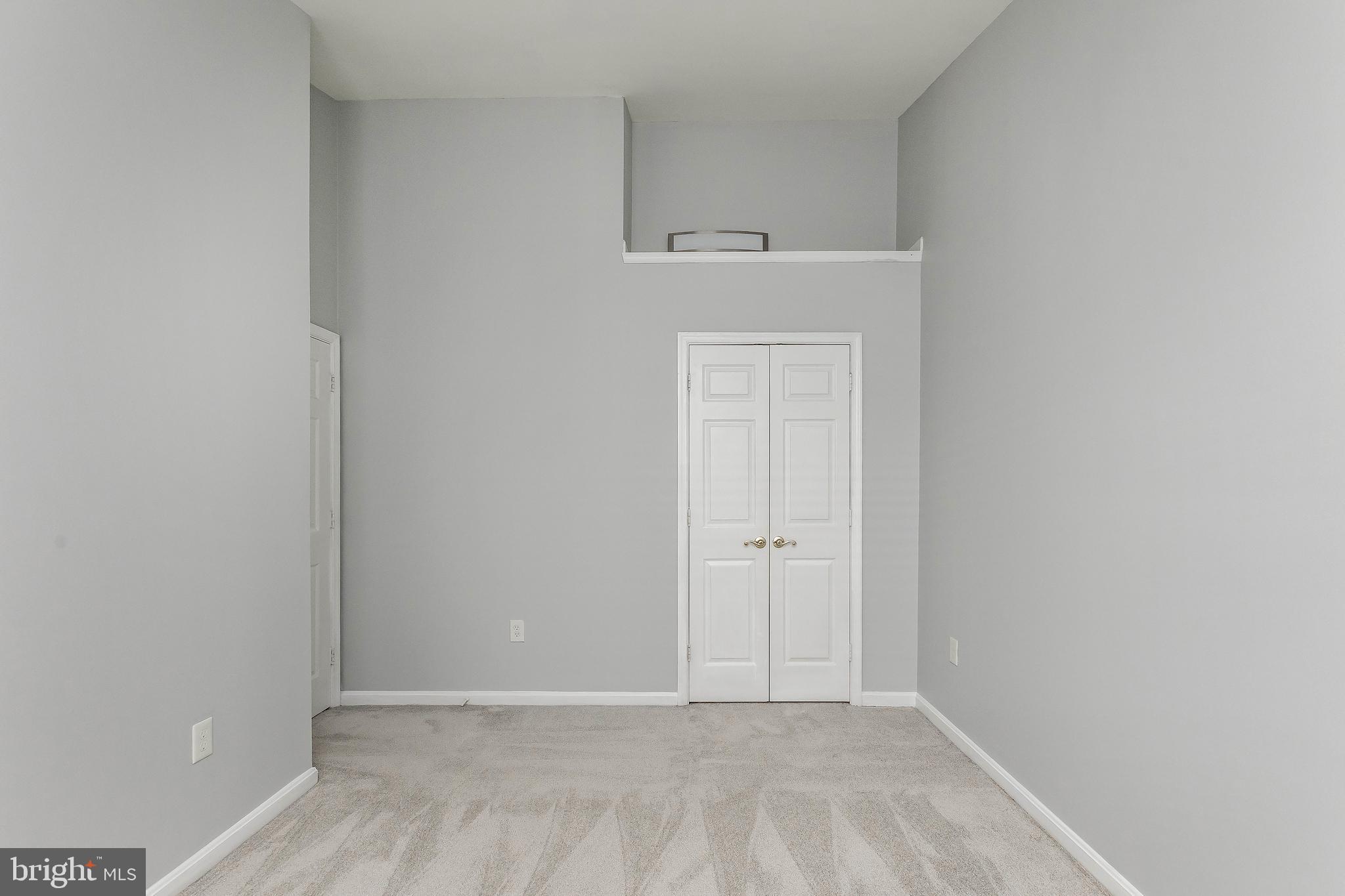 205 Ridgepoint Place Gaithersburg, MD 20878 - Photo 45 of 51 a view of an empty room with cabinet