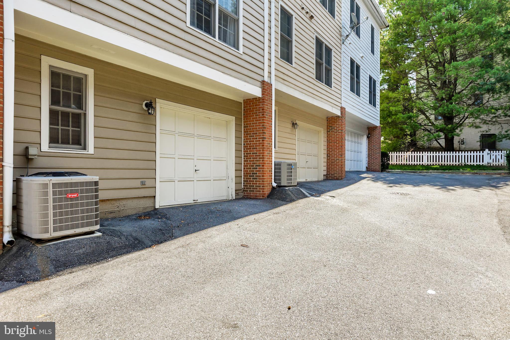 205 Ridgepoint Place Gaithersburg, MD 20878 - Photo 50 of 51 a view of a house with a backyard