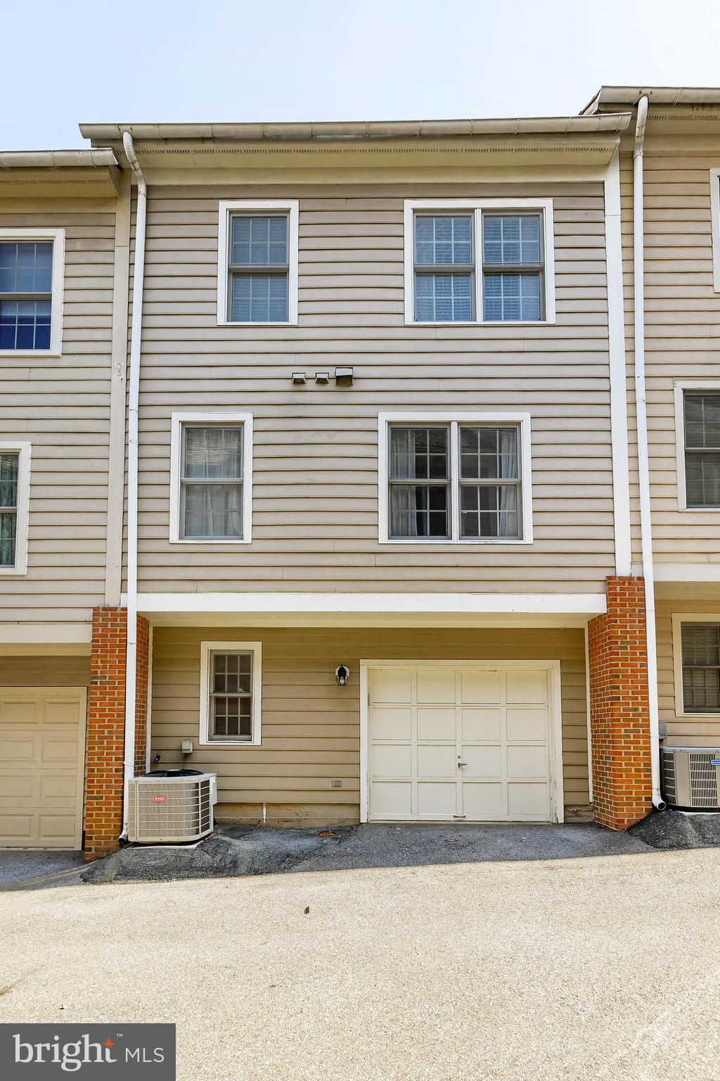 205 Ridgepoint Place Gaithersburg, MD 20878 - Photo 51 of 51 a front view of a house with a garage