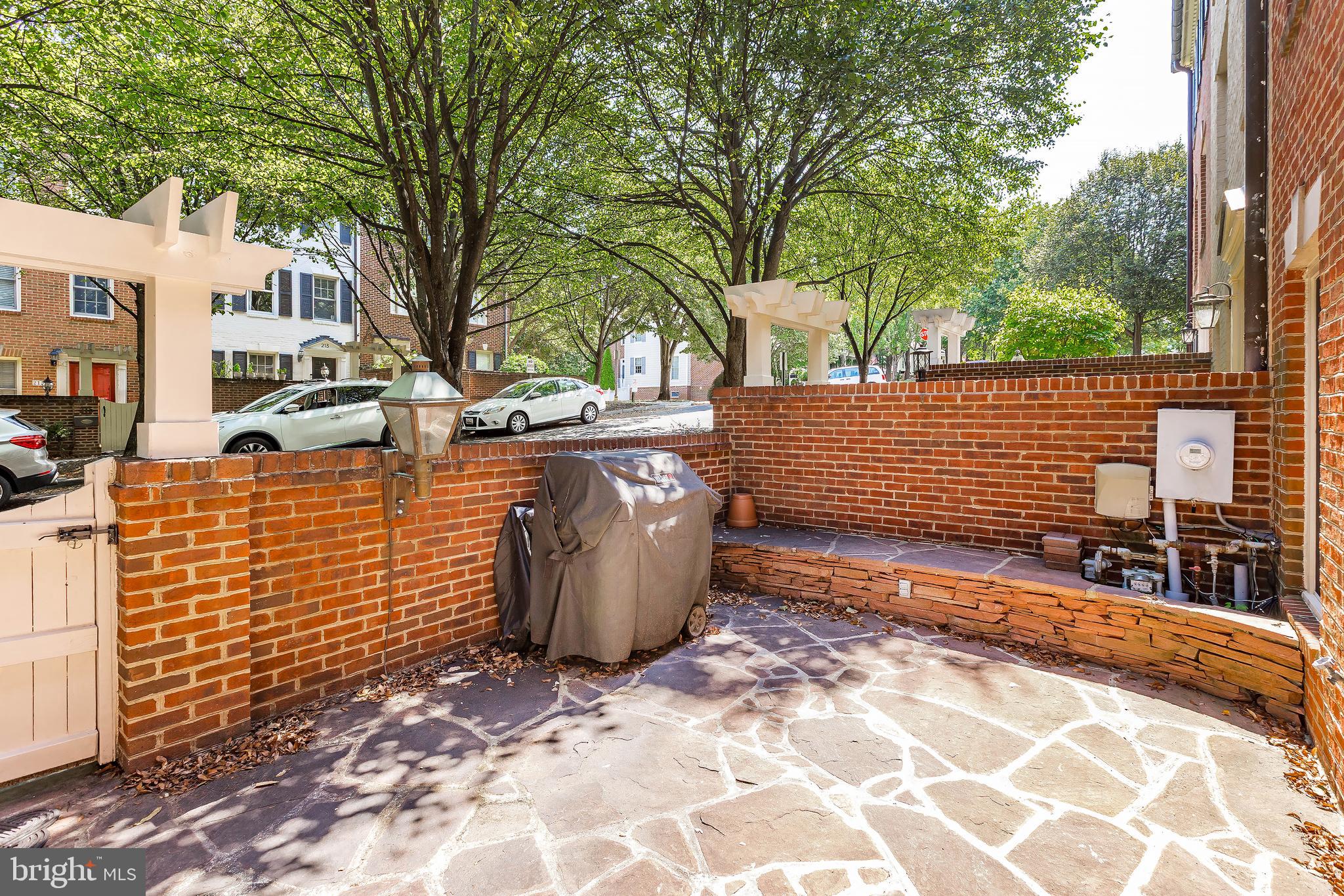 205 Ridgepoint Place Gaithersburg, MD 20878 - Photo 6 of 51 a view of a backyard with tree