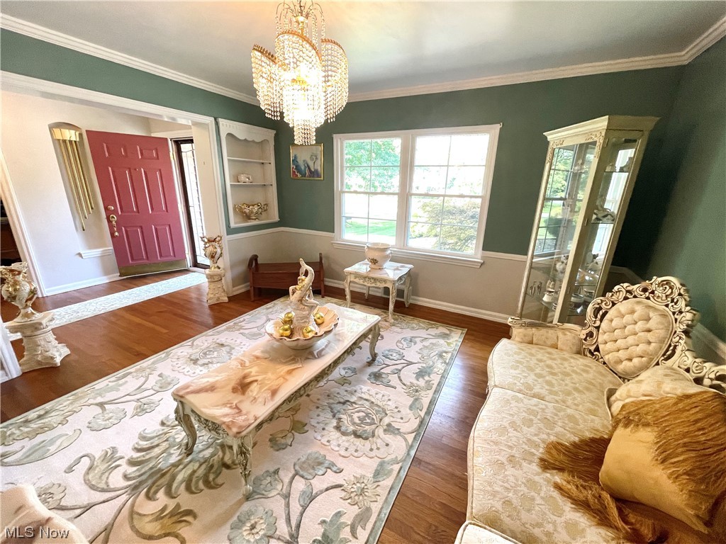 1507 Clubside Road Lyndhurst, OH 44124 - Photo 5 of 32 Hardwood floored living room featuring ornamental molding