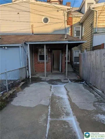 a front view of a building with glass windows