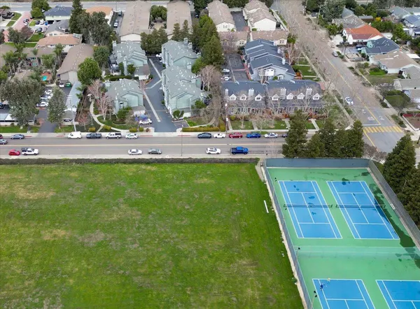 a view of yard with swimming pool