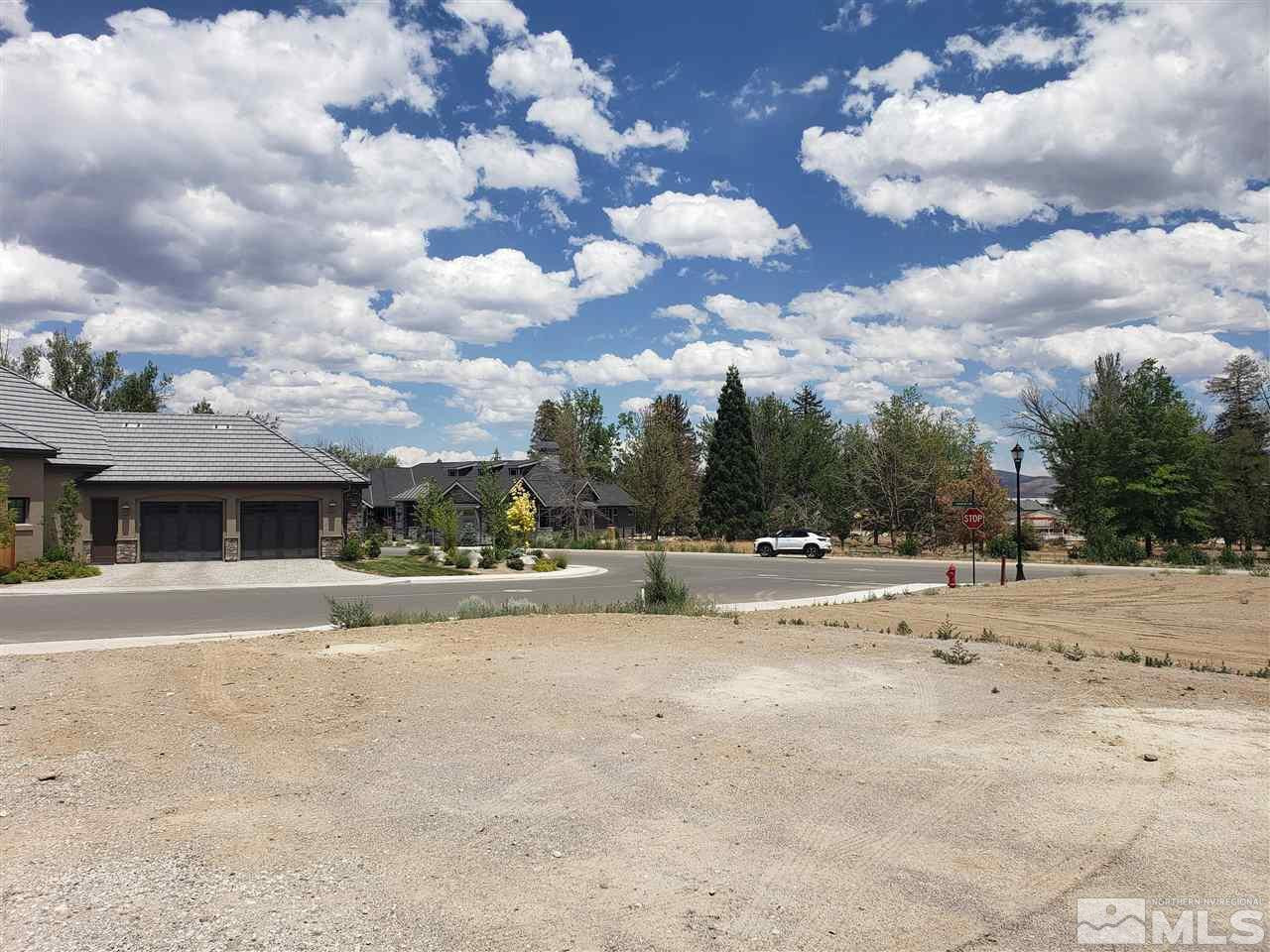 726 Canter Way, Unit LARIAT 10 Reno, NV 89511 - Photo 4 of 12 a view of a yard with a large tree