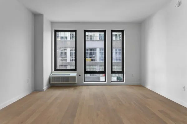 a kitchen with stainless steel appliances granite countertop a sink and a stove