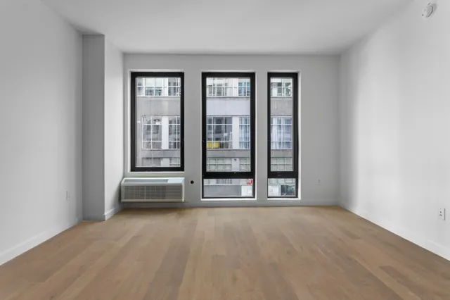 a kitchen with stainless steel appliances granite countertop a sink and a stove