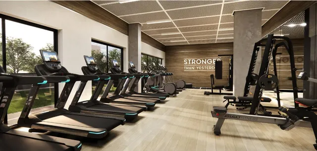 a living room with furniture and large windows