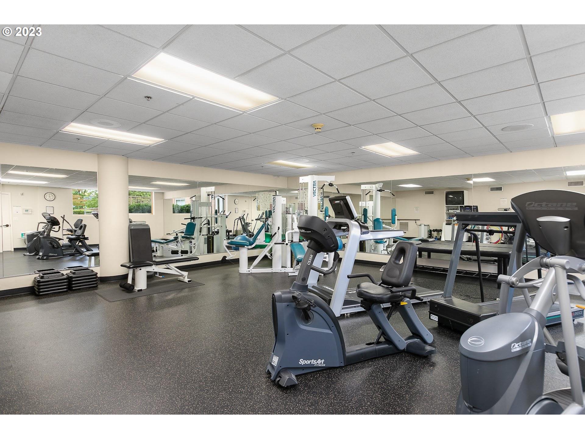 1132 Southwest 19th Avenue, Unit 406 Portland, OR 97205 - Photo 38 of 38 a view of a room with gym equipment