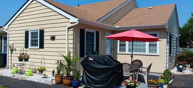 a front view of a house with patio