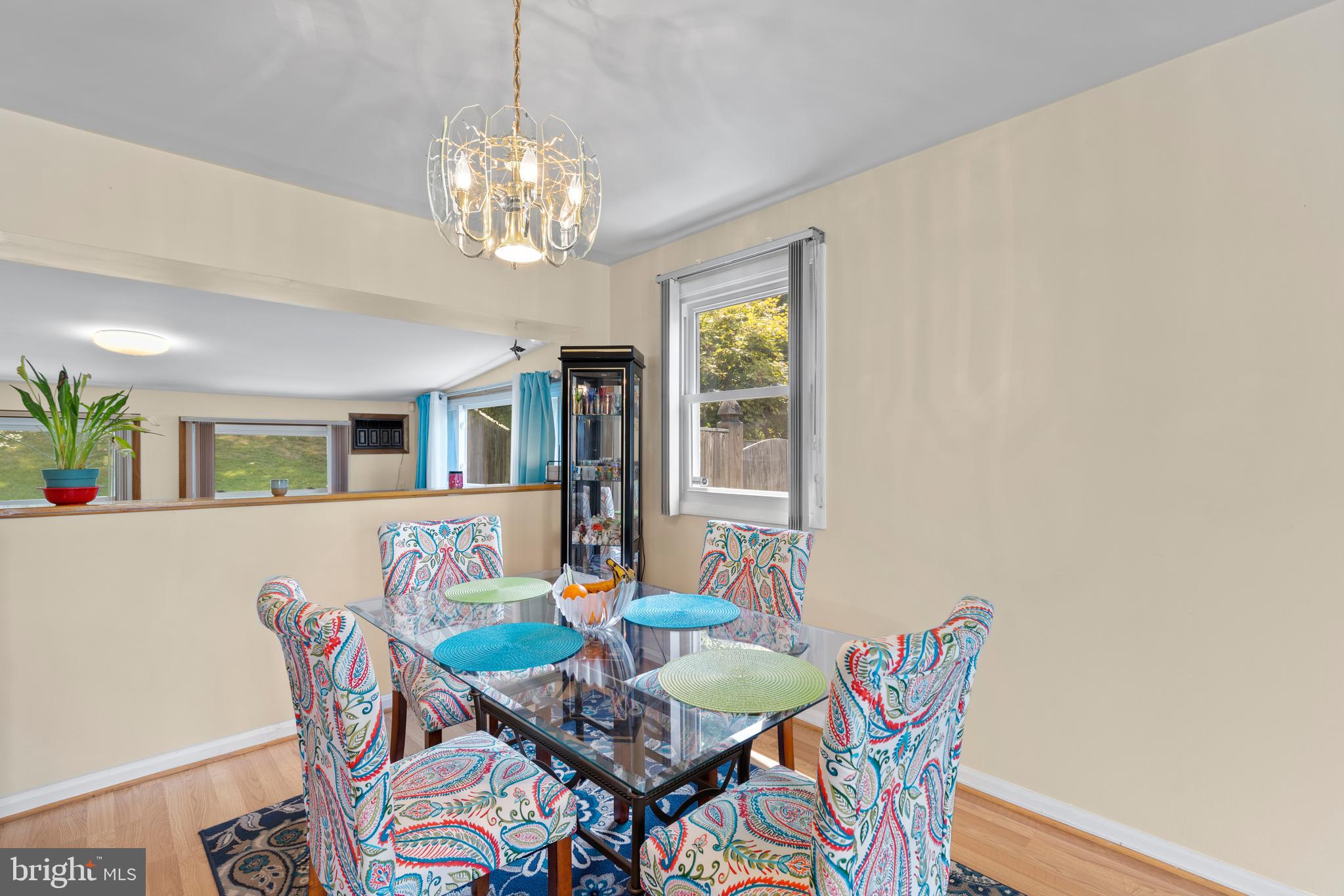 12401 Barbara Road Silver Spring, MD 20906 - Photo 5 of 17 a dining room with furniture and chandelier kitchen view