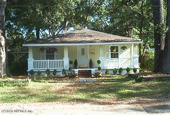 1259 Cook Jacksonville, FL 32205 - Photo 1 of 2 a front view of a house with a yard
