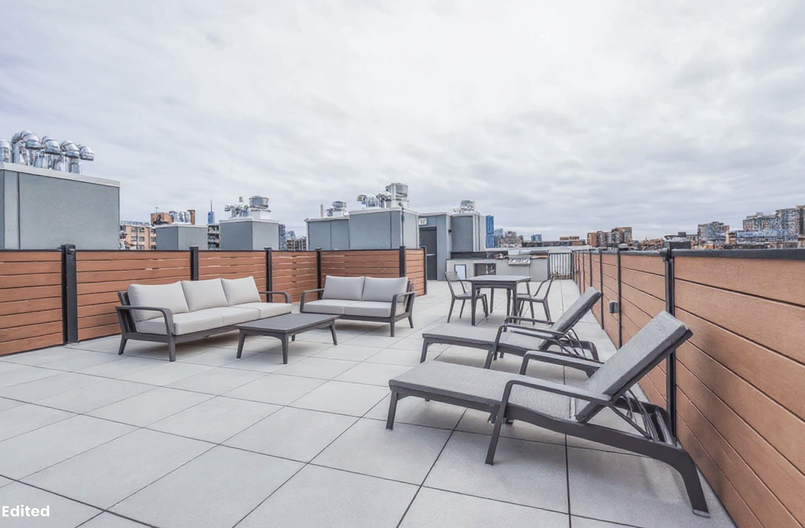303 Madison Street, Unit 408 Hoboken, NJ 07030 - Photo 23 of 26 a terrace with outdoor seating and city view
