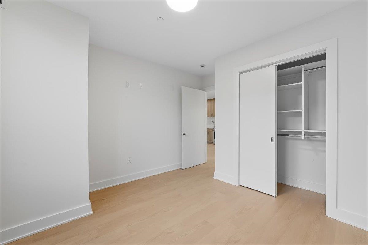 303 Madison Street, Unit 408 Hoboken, NJ 07030 - Photo 7 of 26 a view of an empty room