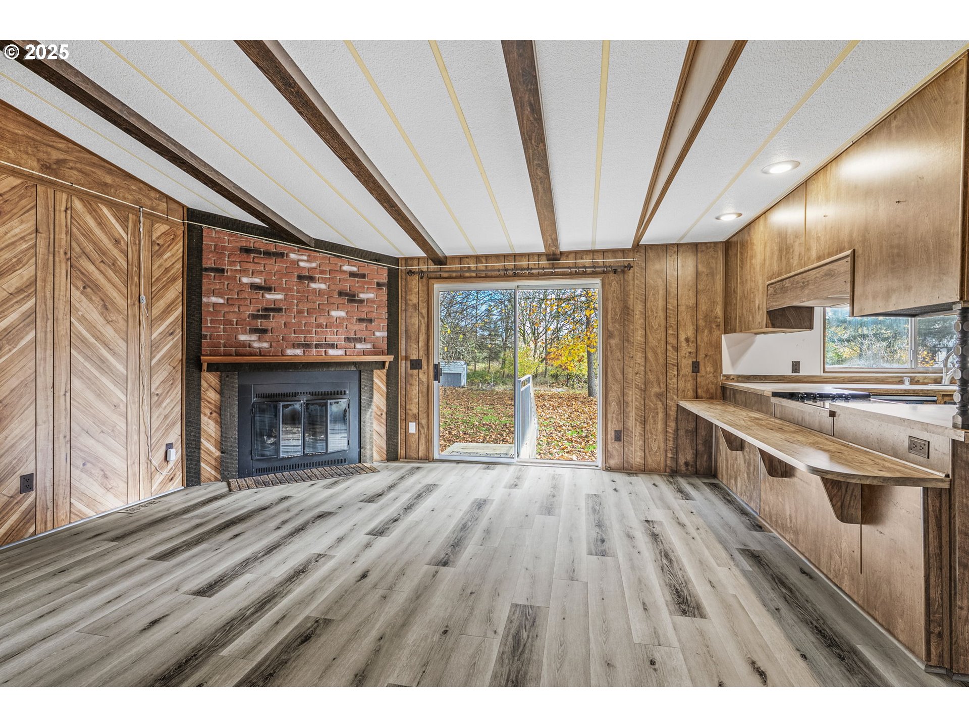 2032 Southeast 283rd Avenue Camas, WA 98607 - Photo 3 of 22 a open kitchen with kitchen island wooden floors and stainless steel appliances