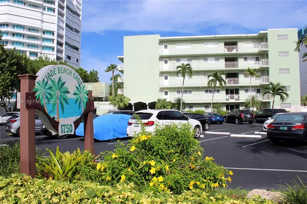 a cars parked in front of a building